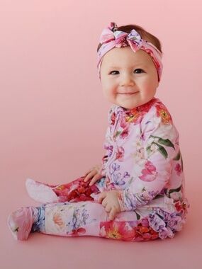 Pair of Posh Peanut Ruffled Zippered One Piece Footies